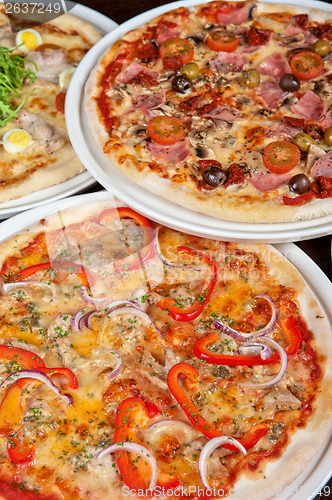 Image of pizza with ham and mushrooms