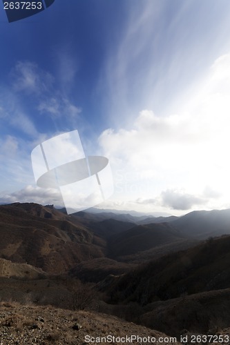 Image of Mountains and blue sky with clouds