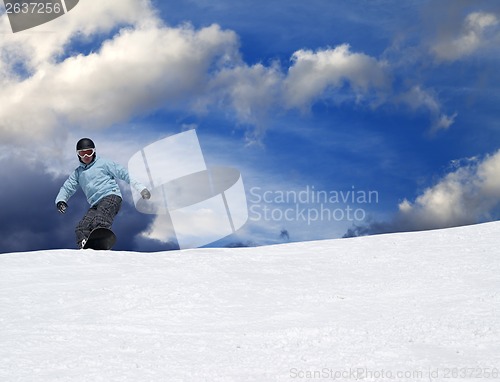 Image of Snowboarder on ski slope