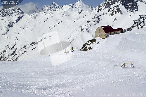 Image of Snowboarder in terrain park