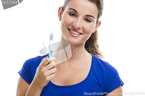 Image of Beautiful woman with a toothbrush
