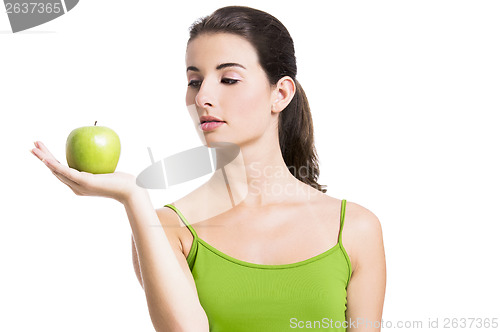 Image of Healthy woman with a green apple
