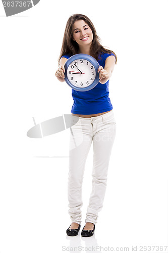 Image of Beautiful woman with a clock