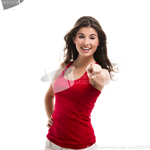 Image of Beautiful woman pointing to somewhere