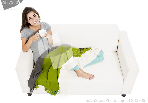 Image of Drinking tea on the sofa