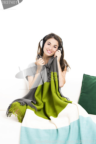 Image of Beautiful woman listen music