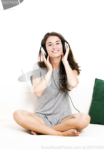 Image of Beautiful woman listen music