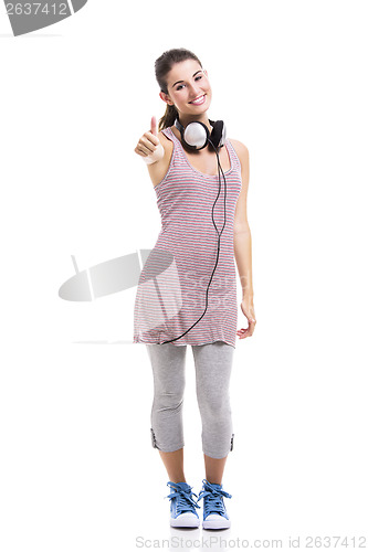 Image of Beautiful woman listen music