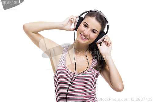 Image of Beautiful woman listen music