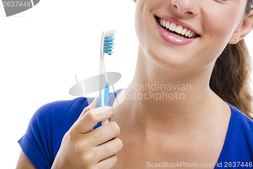 Image of Beautiful woman with a toothbrush