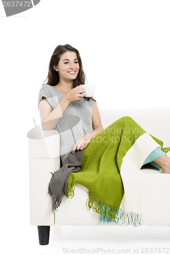 Image of Drinking tea on the sofa