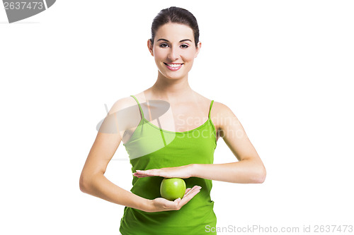 Image of Healthy woman with a green apple