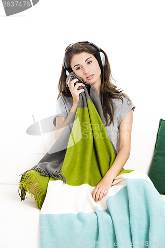 Image of Beautiful woman listen music