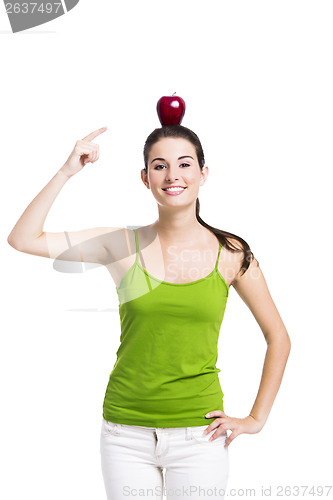 Image of Healthy woman pointing to a apple