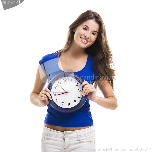 Image of Beautiful woman with a clock