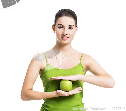 Image of Healthy woman with a green apple