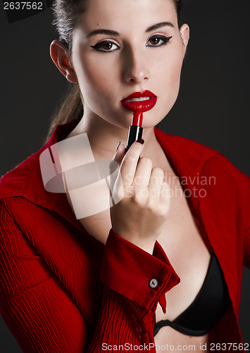 Image of Applying lipstick