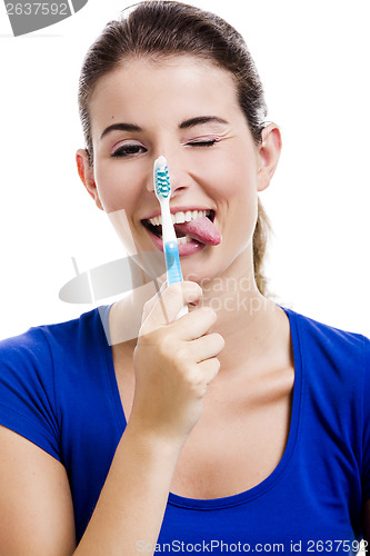 Image of Beautiful woman with a toothbrush