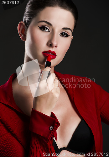 Image of Applying lipstick