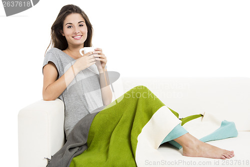 Image of Drinking tea on the sofa