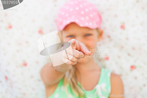 Image of Young girl pointing with finger