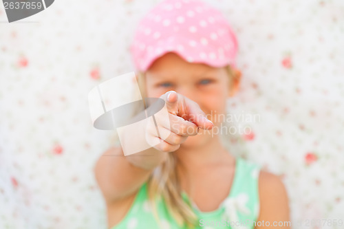 Image of Young girl pointing with finger