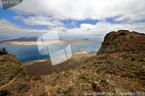 Image of harbor rock stone sky cloud beach  water  coastline graciosa 