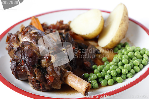 Image of Lamb shank meal with peas and potato