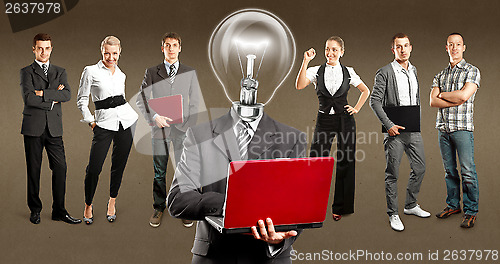 Image of Business Team With Lamp Head