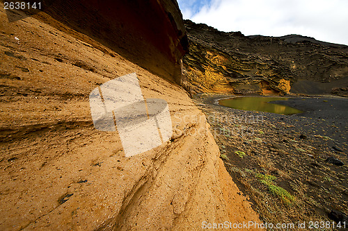 Image of rock stone sky  water  coastline and summer in el golfo l