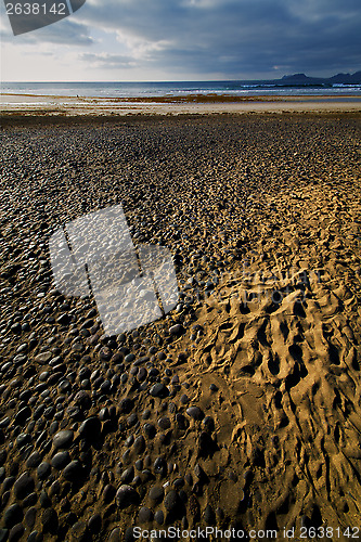 Image of rock stone sky cloud beach  water  coastline and summer