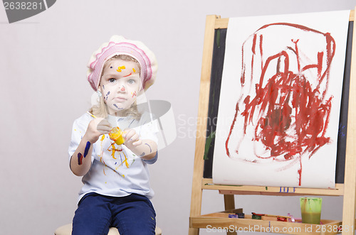 Image of Portrait of a girl artist at the easel