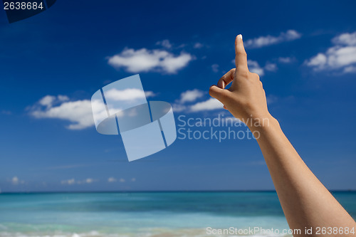 Image of Hand pointing to the sky