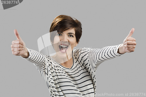 Image of Beautiful woman with thumbs up