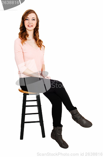 Image of Slim girl sitting.