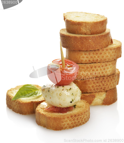 Image of  Bread Rusks With Mozzarella Cheese And Tomatoes