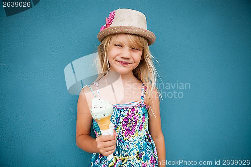 Image of Young girl holding ice cream cone