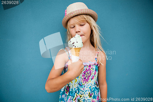 Image of Young girl holding ice cream