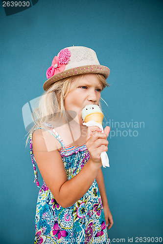 Image of Young girl eating ice cream