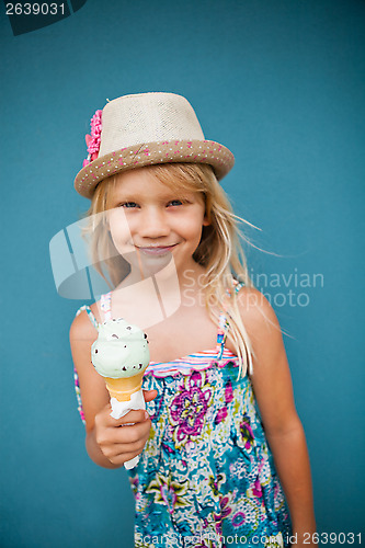 Image of Young girl holding ice cream cone