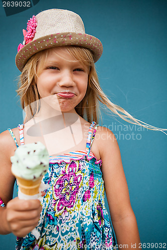 Image of Young girl holding ice cream cone