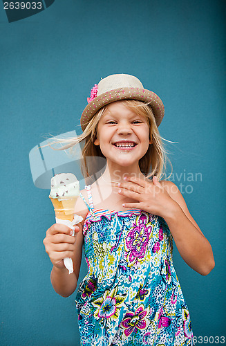 Image of Young girl holding ice cream cone