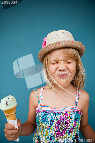 Image of Young girl holding ice cream cone