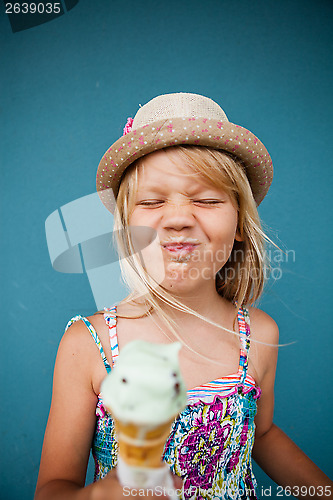 Image of Young girl holding ice cream cone