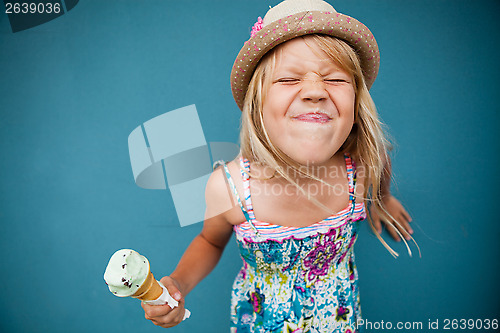 Image of Young girl holding ice cream cone