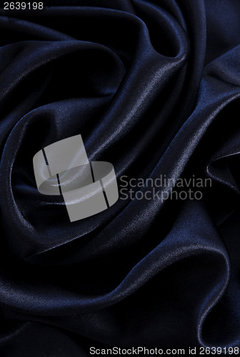 Image of Smooth elegant black silk as background 