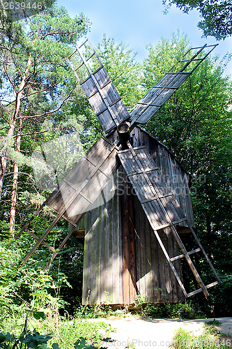 Image of big mill in the forest