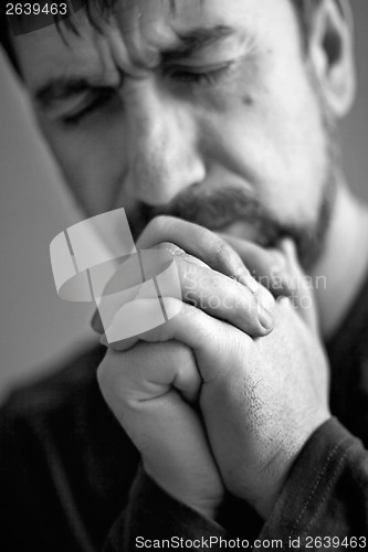 Image of man praying