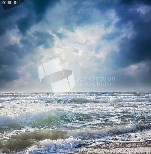 Image of dark sky on a stormy sea