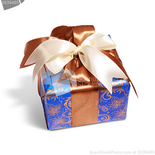 Image of gift packing tied by ribbon